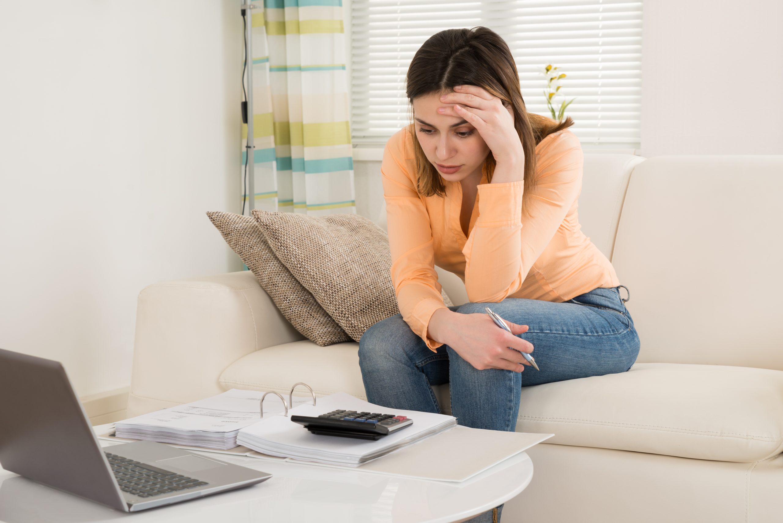 Woman prepares for debt payments